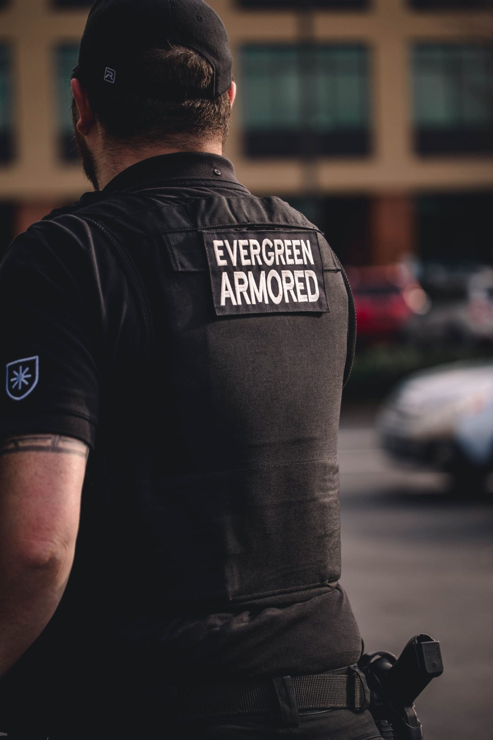 Back of man in Evergreen Armored uniform