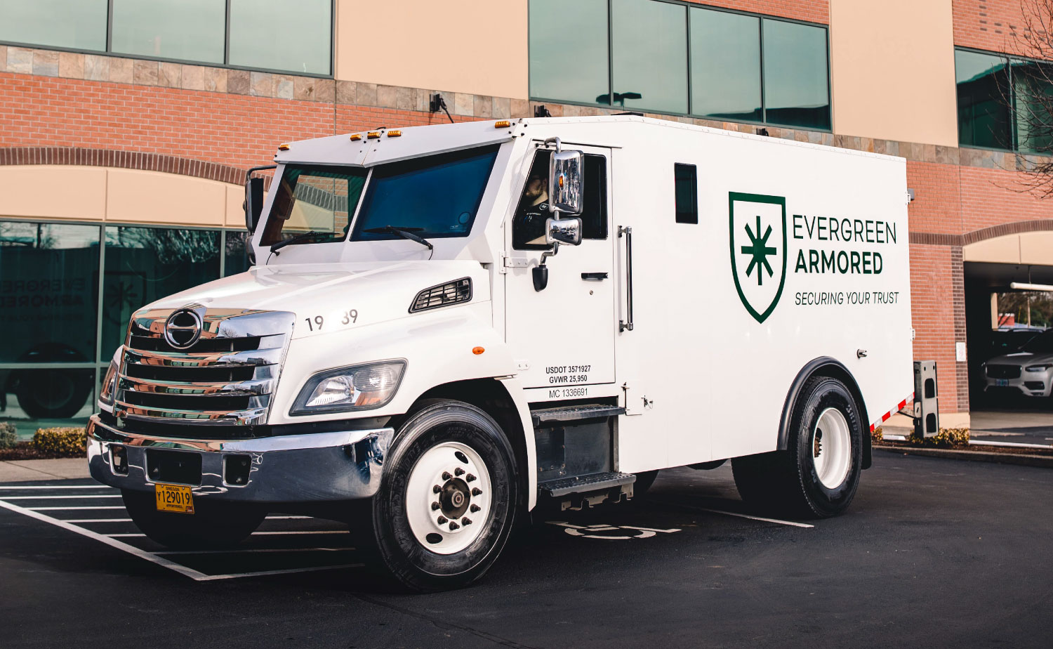 Evergreen Armored Truck in parking lot